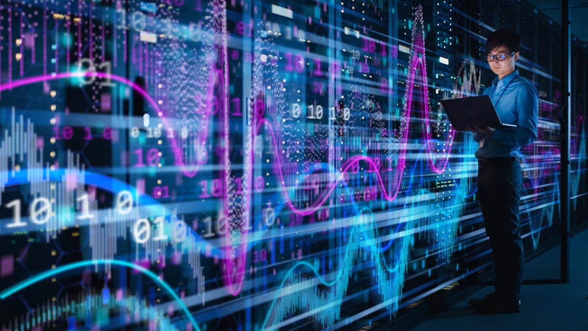 Shot of Asian IT Specialist Using Laptop in Data Center Full of Rack Servers. Concept of Massive Computer Calculations with Visualization Projection of Statistics, Mathematics Graphs and Digits. — Photo