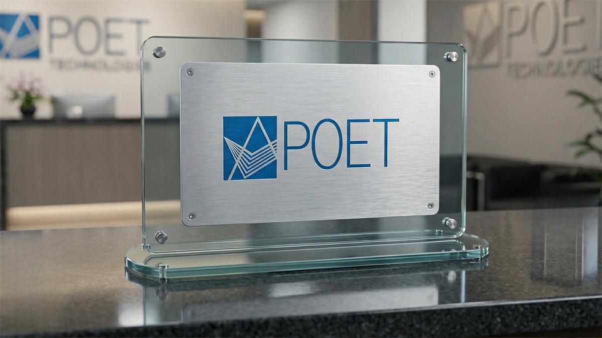 POET Technologies logo displayed on a glass plaque in a modern office, highlighting the company’s photonics focus.