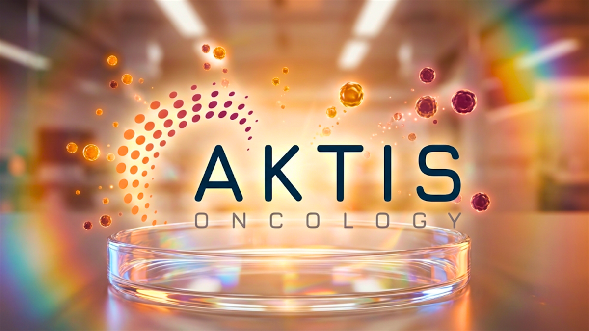 AKTIS Oncology logo above a laboratory dish with glowing molecular particles, representing cancer research and drug development.