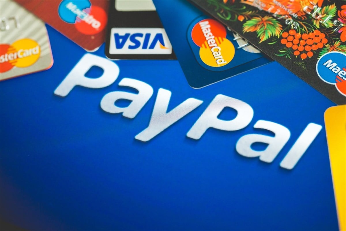 Paypal and credit cards on background — Stock Editorial Photography