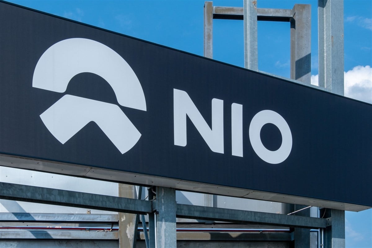 premium Chinese NIO service center, brand name, corporate NIO logo against blue sky, electric vehicle market, sustainable and high-tech mobility innovation, Ludwigshafen, Germany - June 14, 2025