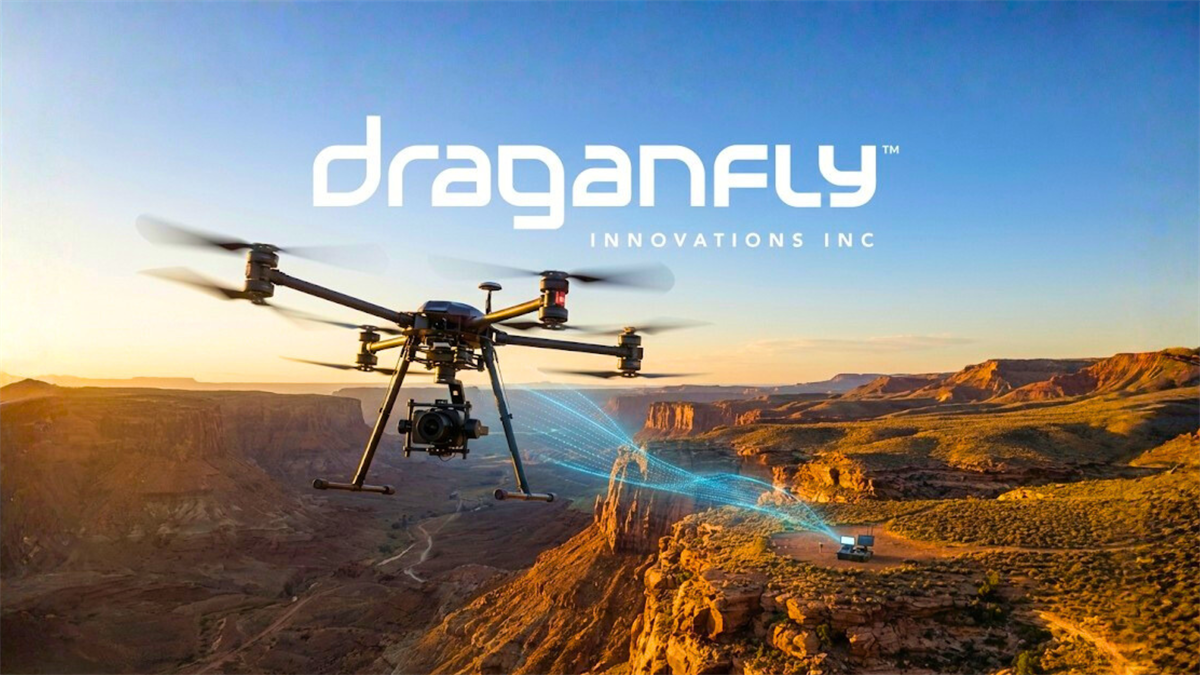 Drone flying over a canyon under the Draganfly logo, highlighting commercial drone technology and aviation tech growth.