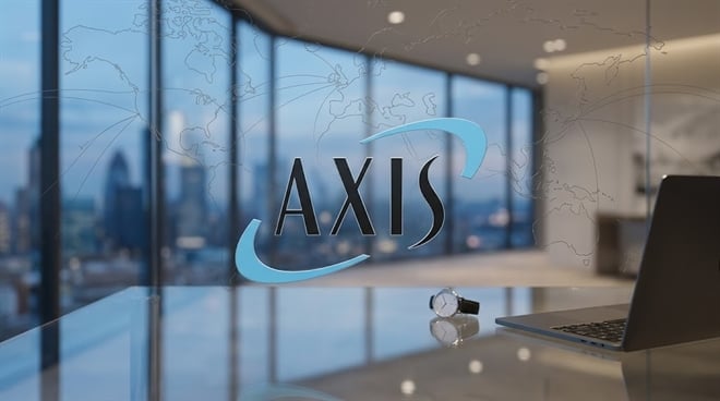 Axis Capital logo centered over a glass desk in a modern, high-rise corporate office setting.