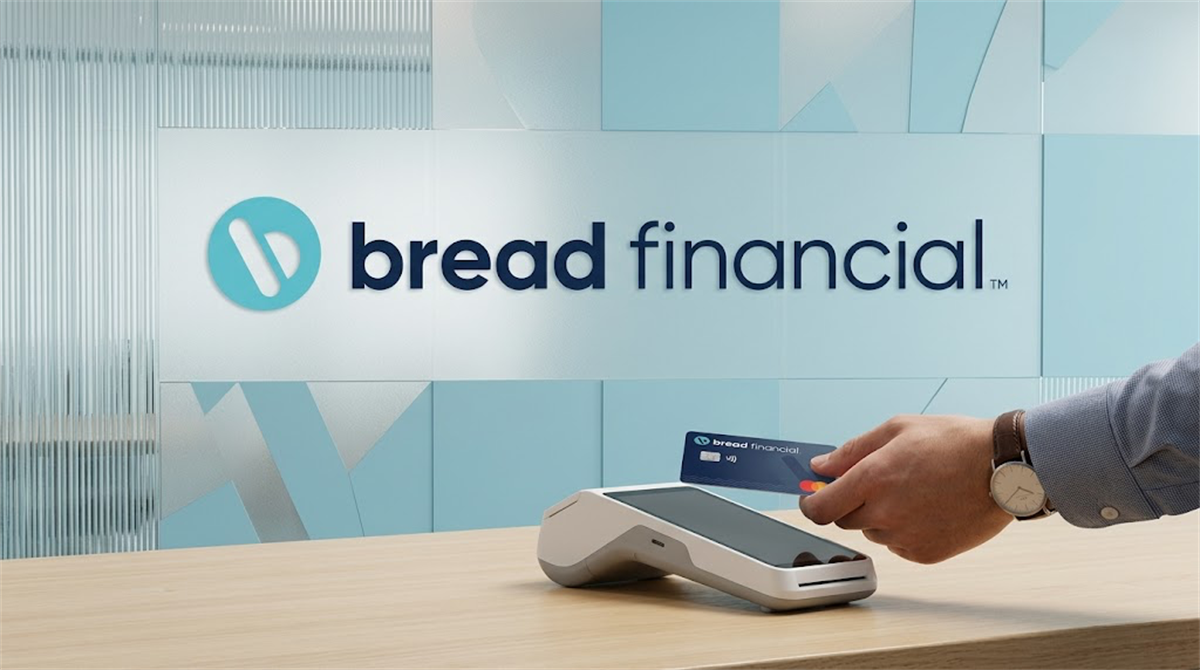 Bread Financial logo on a wall behind a person tapping a Bread Financial credit card on a payment terminal.