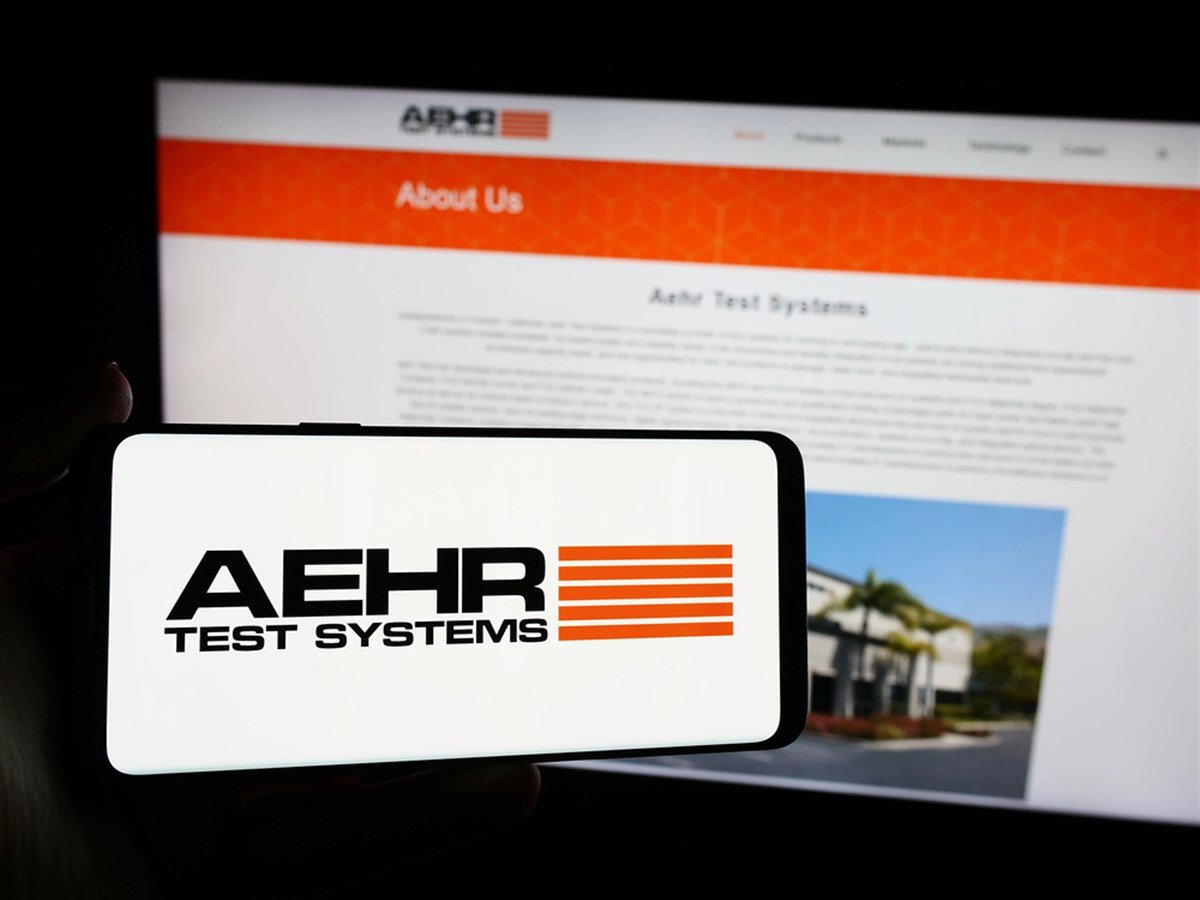 Stuttgart, Germany - 04-28-2024: Person holding smartphone with logo of US semiconductor testing company Aehr Test Systems in front of website. Focus on phone display.