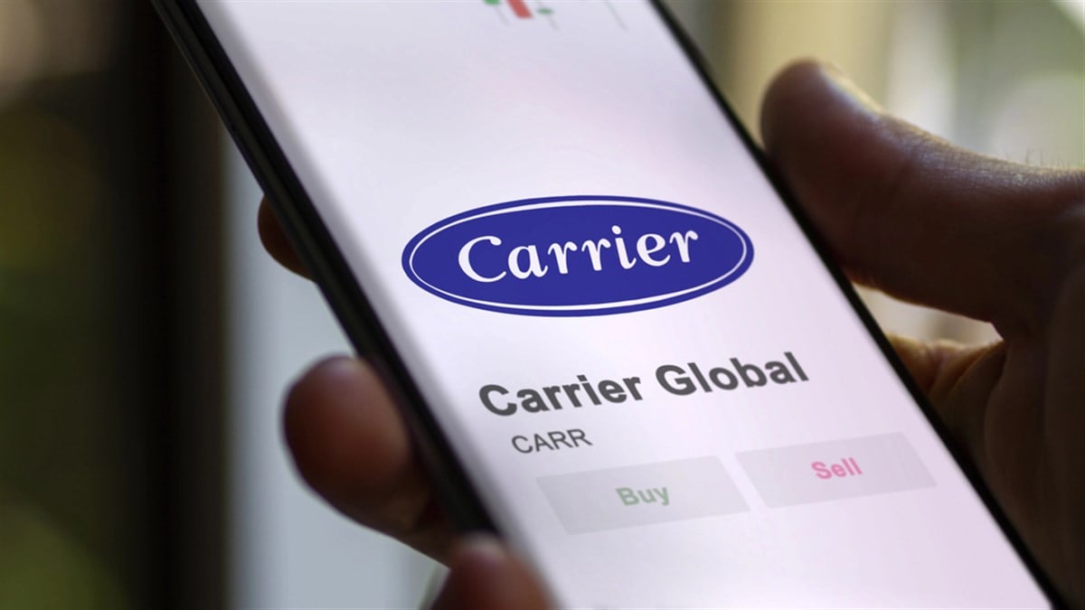The logo of Carrier Global on the screen of an exchange. Carrier Global price stocks, $CARR on a device.