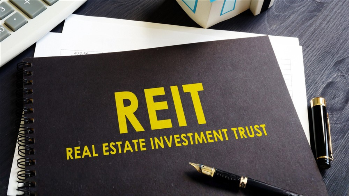 Real estate investment trust REIT on an office desk.