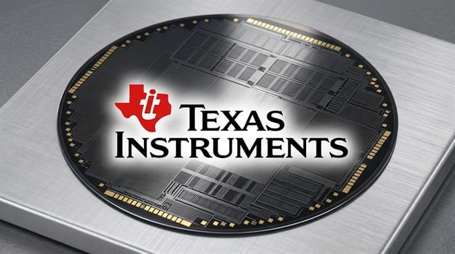 Texas Instruments logo overlaid on a semiconductor wafer resting on a metal surface.