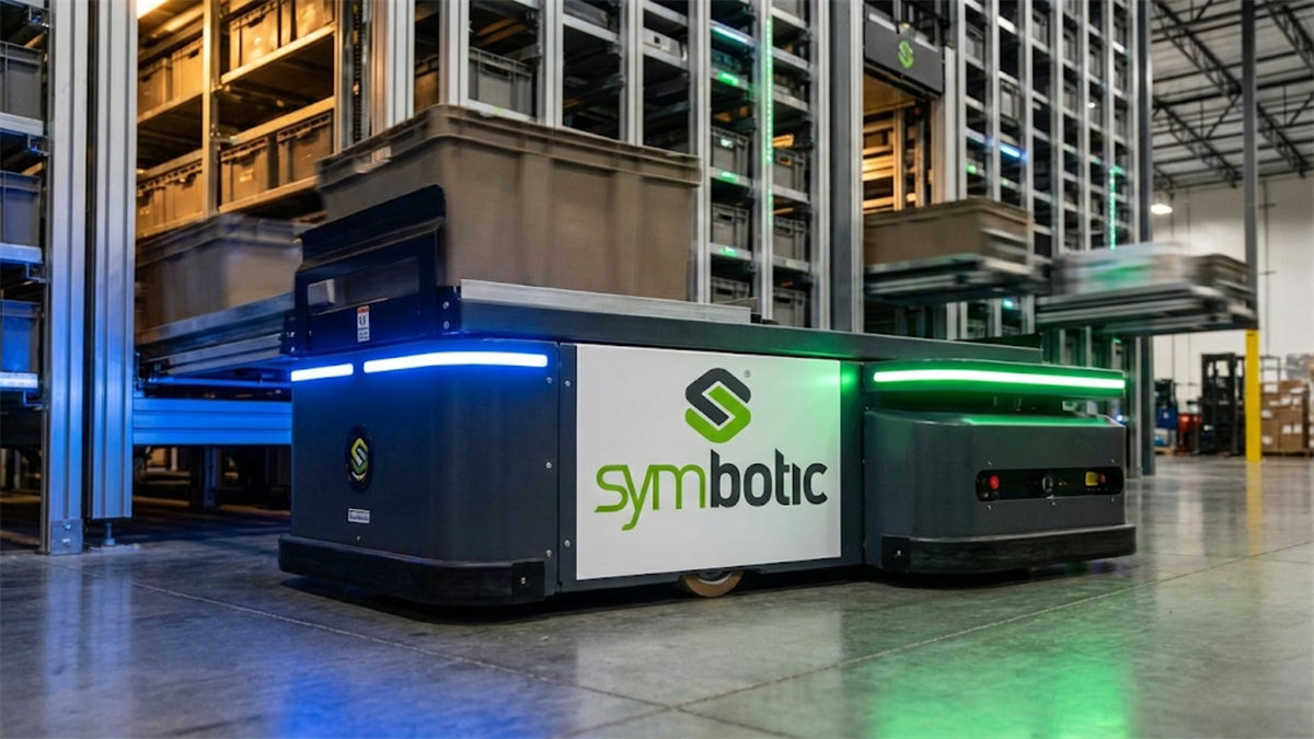 Symbotic warehouse robot moves totes through an automated storage system, highlighting logistics automation growth.
