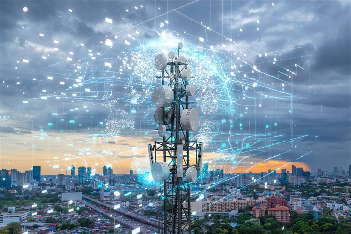 Telecommunication tower with 5G cellular network antenna on city background, Global connection and internet network concept