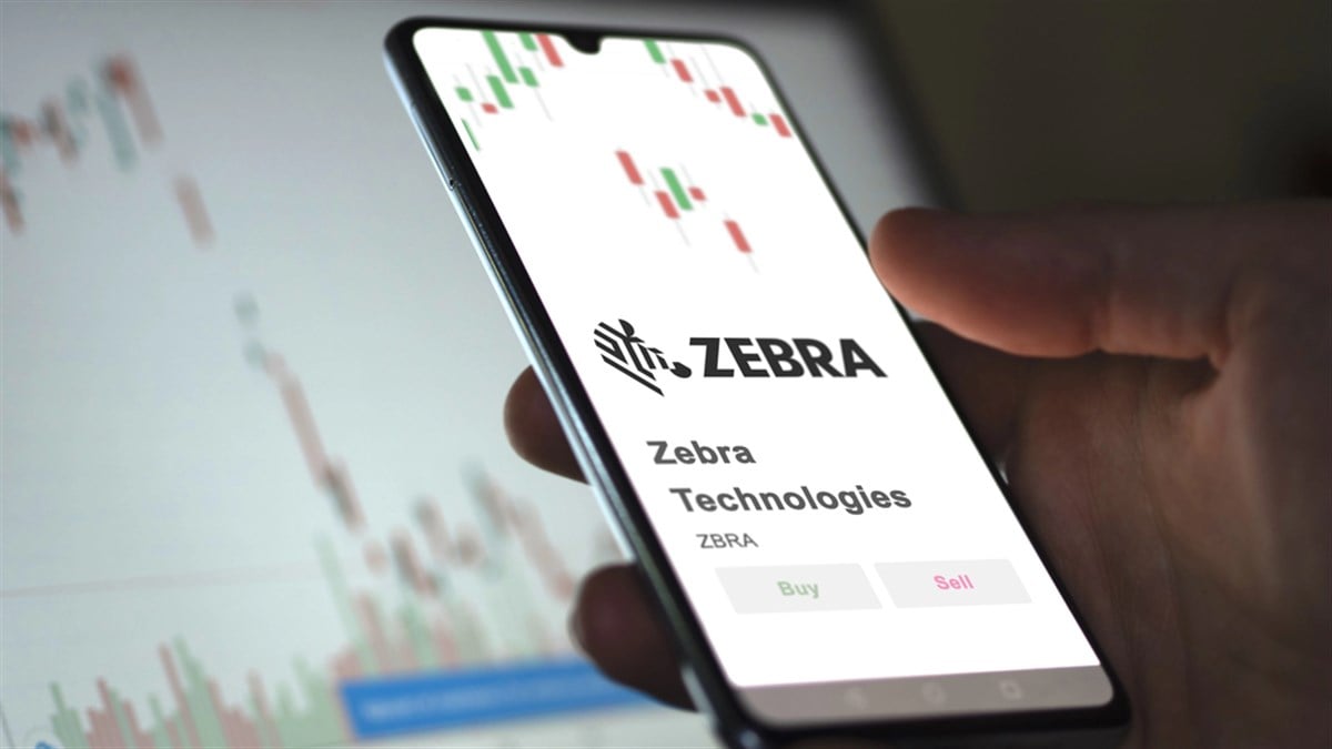 Phone screen displays ZEBRA Technologies stock