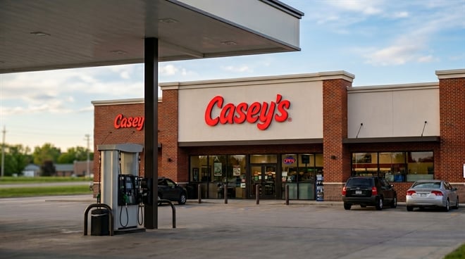 Exterior of a Casey's General Store convenience store and gas station with fuel pumps in the foreground.