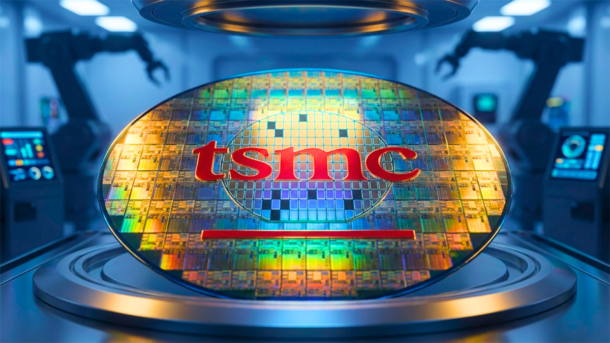 TSMC logo on silicon wafer in chip fab, highlighting semiconductor supply and Taiwan tech stock outlook.