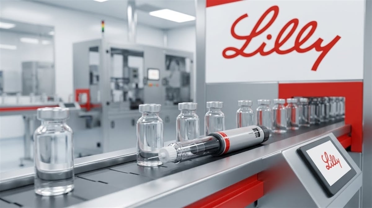 Eli Lilly pharmaceutical manufacturing facility with glass vials and an auto-injector pen on a production line.