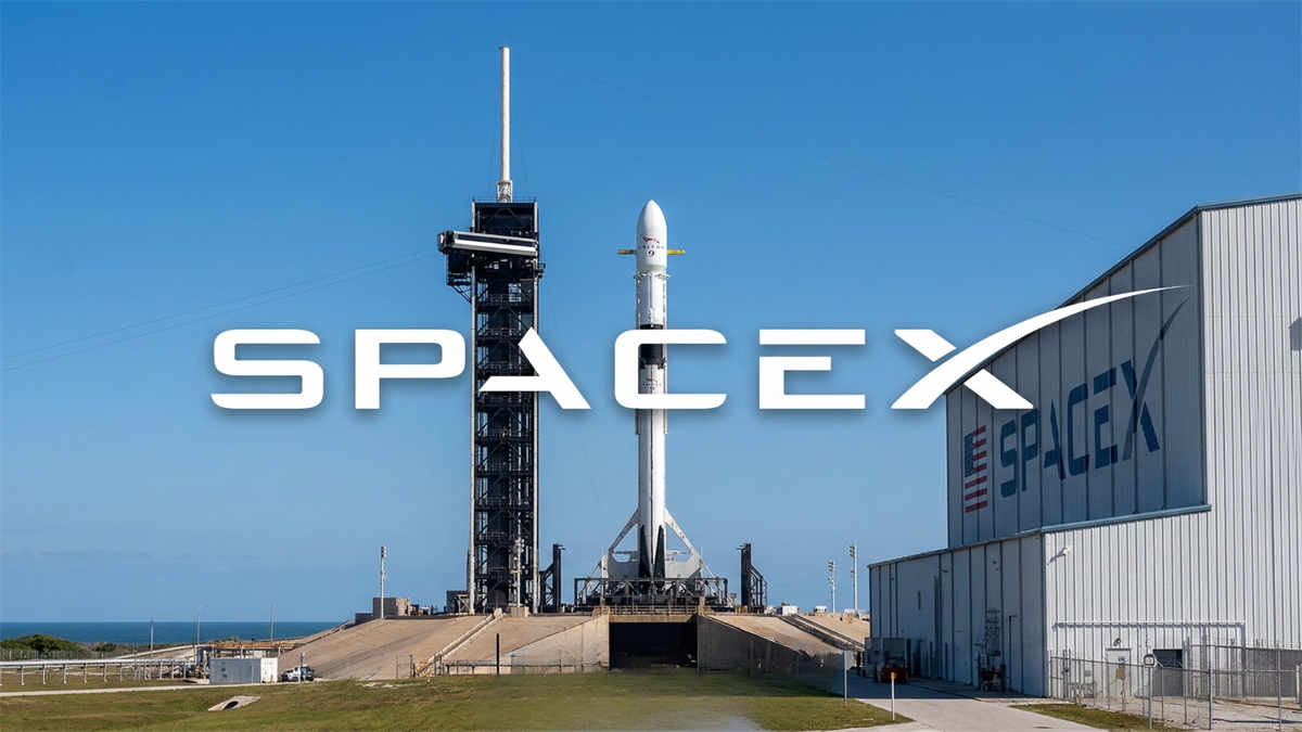 SpaceX rocket on coastal launch pad with large SpaceX branding, illustrating SpaceX ahead of its anticipated IPO.