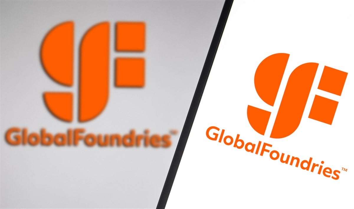 December 14, 2021, Brazil. In this photo illustration the GlobalFoundries logo seen displayed on a smartphone and on the background