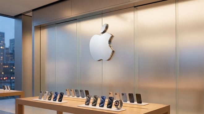An Apple retail store display table showing iPhones and an Apple Watch beneath the Apple logo.