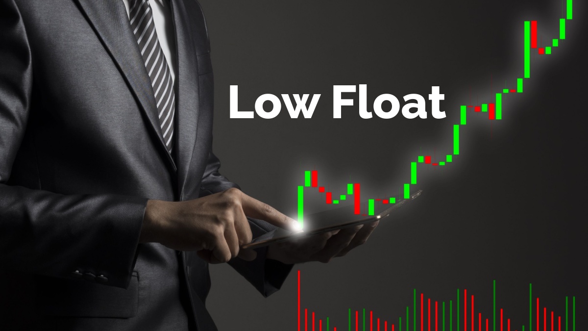 Businessman in black suit points to rising red and green stock chart, with the words low float above it in white letters.