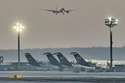 FILE - A plane comes in for landing as Lufthansa aircraft are parked at the airport due to a two-day strike by Lufthansa pilots, in Frankfurt, Germany, Thursday, March 12, 2026. (AP Photo/Michael Probst, File)