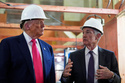 FILE - President Donald Trump listens to Federal Reserve Chairman Jerome Powell speak during a visit to the Federal Reserve, July 24, 2025, in Washington. (AP Photo/Julia Demaree Nikhinson, File)