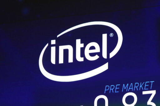 FILE - In this Oct. 3, 2018, file photo the Intel logo appears on a screen at the Nasdaq MarketSite, in New York's Times Square. Intel said it is buying Israeli company Tower Semiconductor for $5.4 billion in a deal that could give the California chipmaking giant an edge in the business of making custom-designed chips. Intel CEO Pat Gelsinger said Tuesday, Feb. 15, 2022 that acquiring Tower will help expand Intel’s newly formed “foundry” business that makes microprocessors for other firms. (AP Photo/Richard Drew, File)