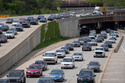 FILE - Vehicles travel on Interstate 90 and Interstate 94 ahead of Memorial Day weekend May 22, 2025, in Chicago. (AP Photo/Erin Hooley, File)