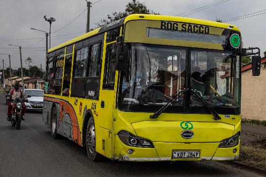 A battery electric bus drives through the streets of Nairobi, Kenya, Tuesday, Feb. 17, 2026. (AP Photo/Samson Otieno)