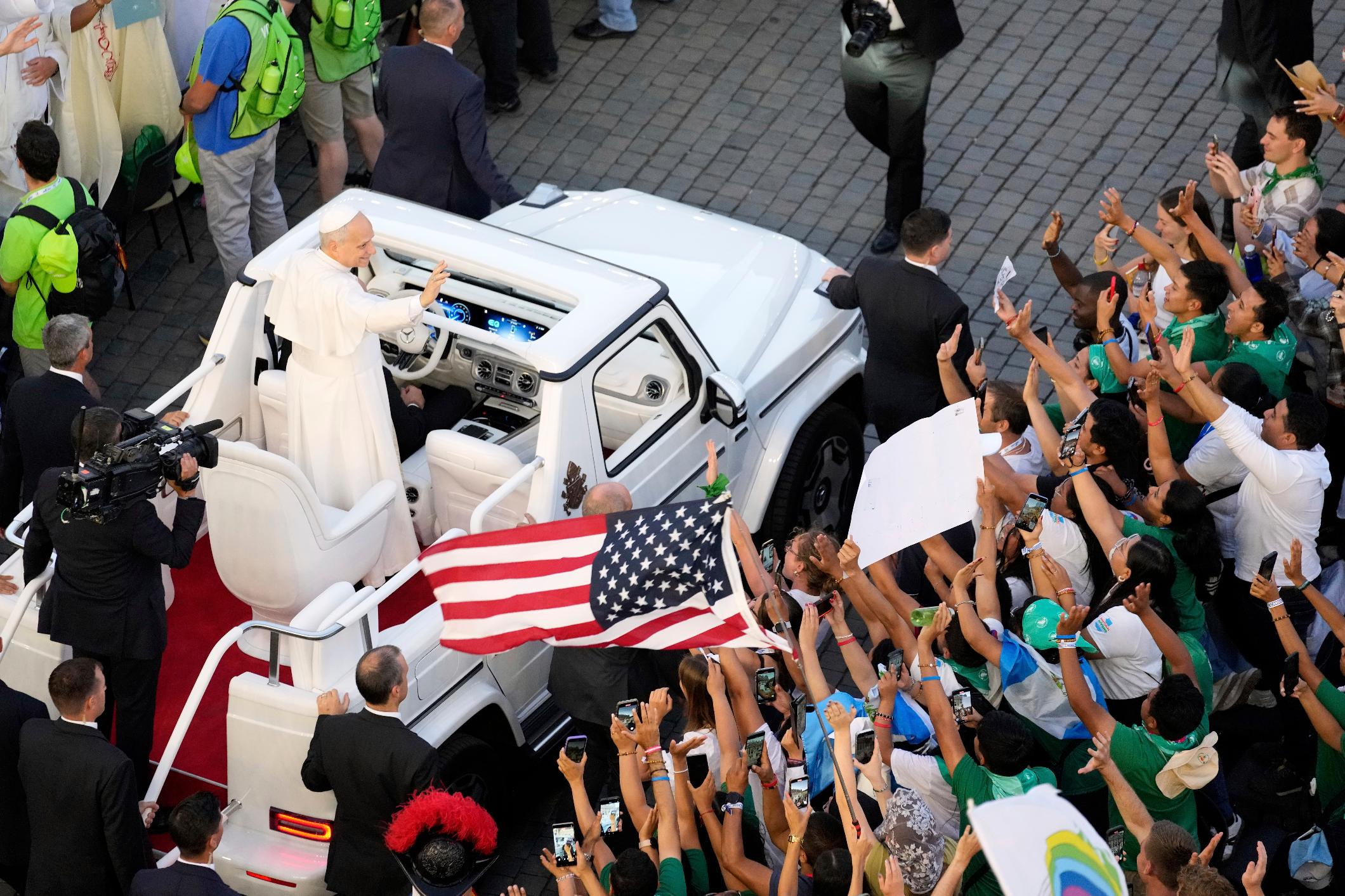 Pope Leo XIV greets faithful in St. Peter's Square at the end of a welcome mass for the Youth Jubilee at the Vatican, Tuesday, July 29, 2025. (AP Photo/Gregorio Borgia)