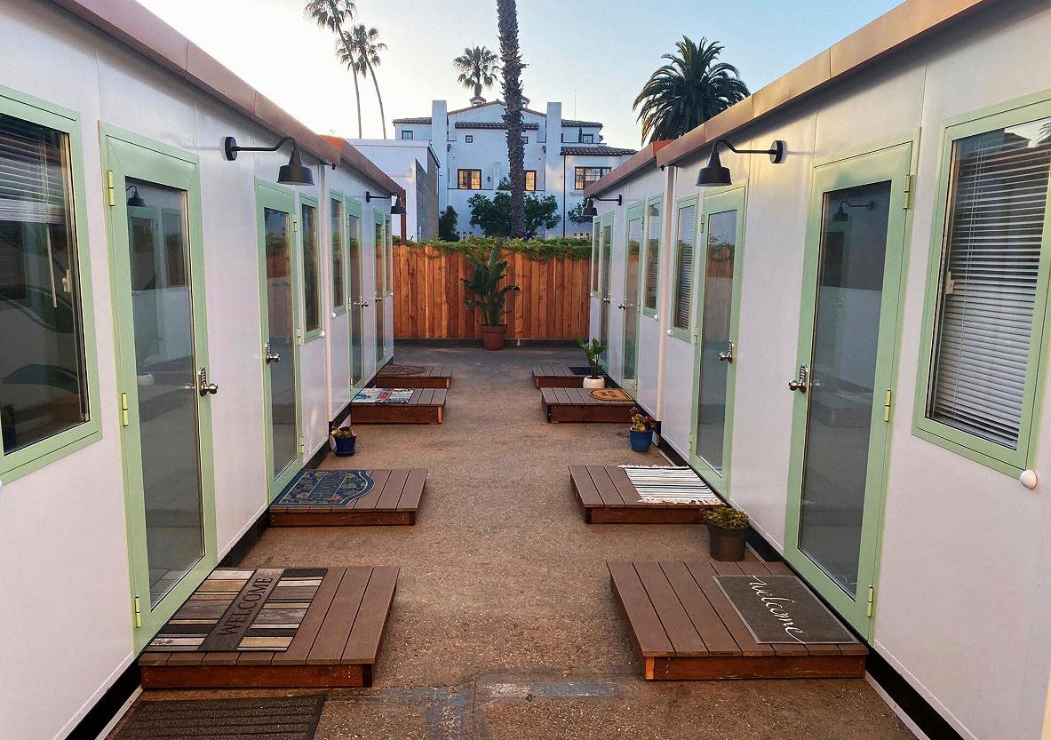 This image courtesy of Dignity Moves shows the tiny homes community in downtown Santa Barbara, Calif., photographed in 2022. Dignity Moves and the County of Santa Barbara partnered on this interim supportive housing community, consisting of 34 private rooms with shared community spaces and access to county services. (Dignity Moves via AP)