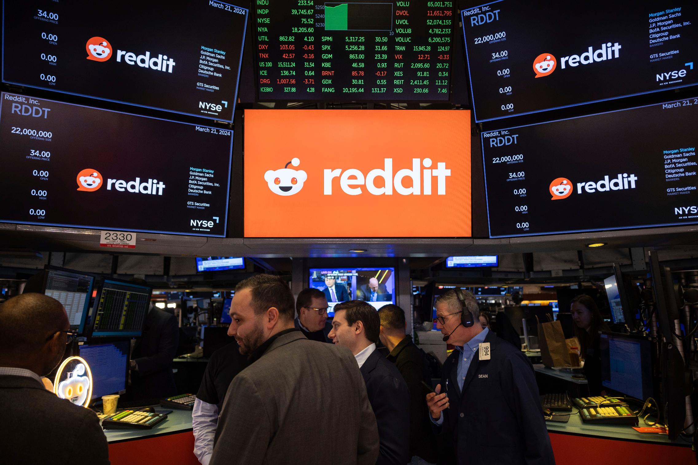FILE - Reddit Inc. logos are displayed on the New York Stock Exchange trading floor, prior to the company's IPO, Thursday, March. 21, 2024. (AP Photo/Yuki Iwamura, File)