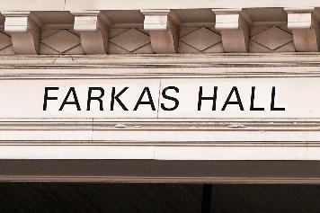 A sign is displayed on Farkas Hall, which was endowed by Harvard University alum Andrew Farkas, Friday, Jan. 31, 2025, in Cambridge, Mass. (AP Photo/Charles Krupa, File)