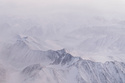 FILE - Snow covers the mountains of the Brooks Range in the Arctic National Wildlife Refuge, Oct. 14, 2024, near Kaktovik, Alaska. (AP Photo/Lindsey Wasson, File)