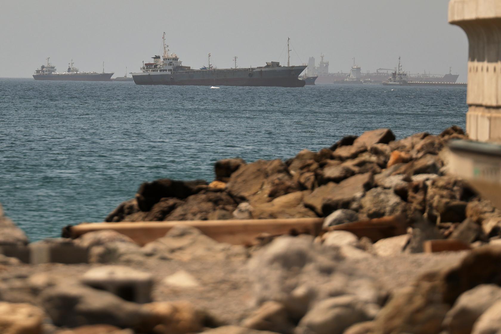 Tankers and cargo vessels are seen in the Gulf of Oman, along shipping routes linking the Strait of Hormuz and the Arabian Sea, Tuesday, June 16, 2026. (AP Photo)