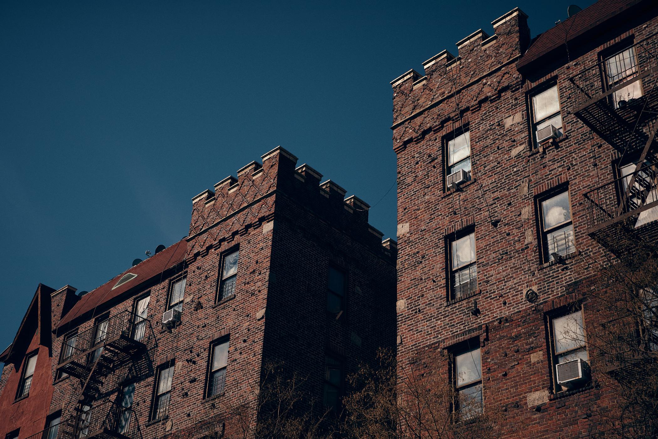Sunlight illuminates an apartment building where tenants report maintenance issues and pest infestations, in the Bronx borough of New York, on Tuesday, March 17, 2026. (AP Photo/Andres Kudacki)