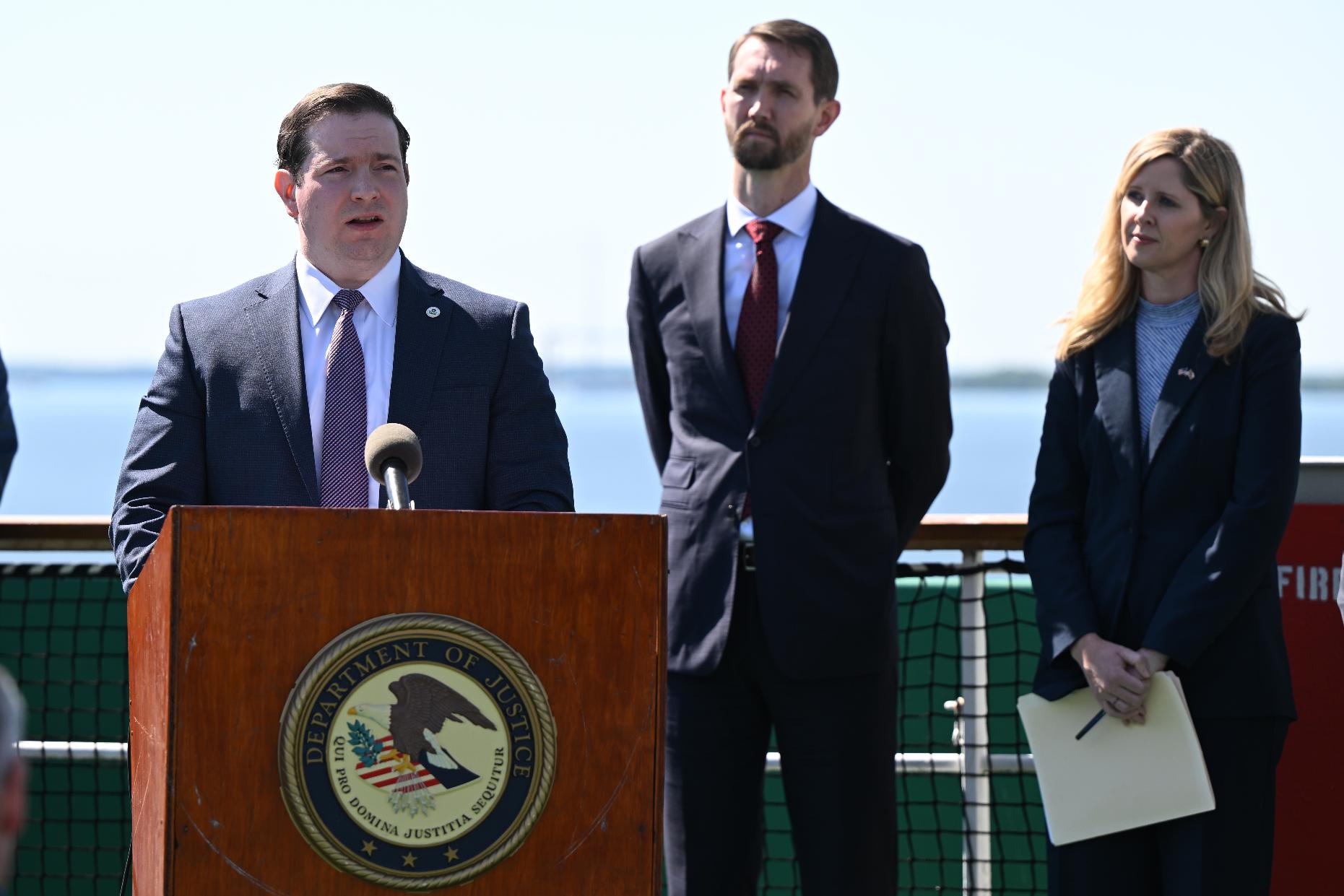 EPA Assistant Administrator Jeffrey A. Hall , left, updates reporters about the investigation of the Dali container vessel and Francis Scott Key Bridge during a news conference Tuesday, May 12, 2026 in Baltimore. (AP Photo/Gail Burton)