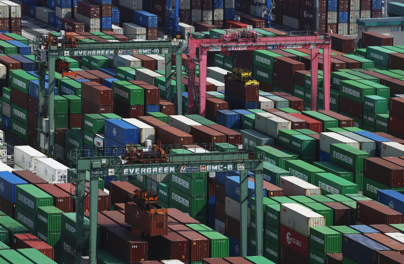 Containers are stacked at a port in Tokyo Tuesday, May 19, 2026. (Michi Ono/Kyodo News via AP)