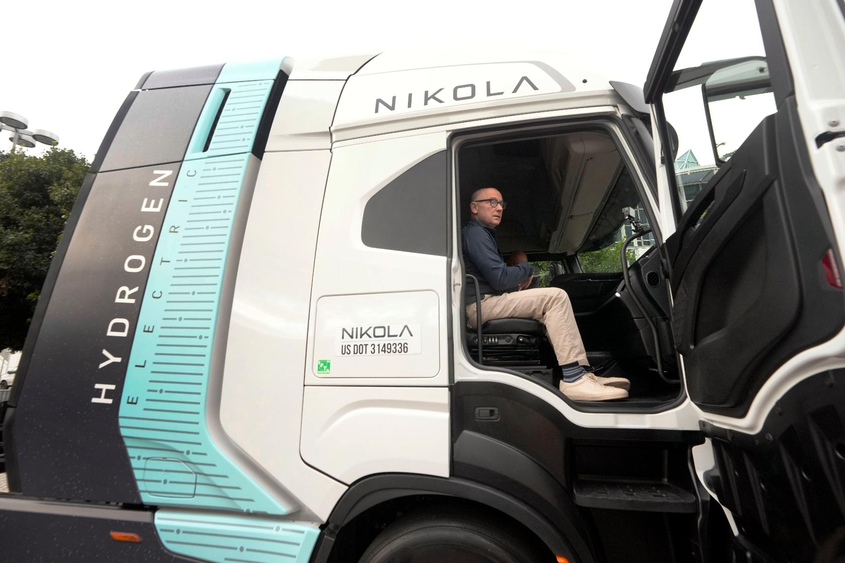 FILE - Stephen Girsky, CEO of Nikola Corp., sits in one of the company's electric and hydrogen-powered trucks during the LA Auto Show, Thursday, Nov. 16, 2023, in Los Angeles. (AP Photo/Damian Dovarganes, file)