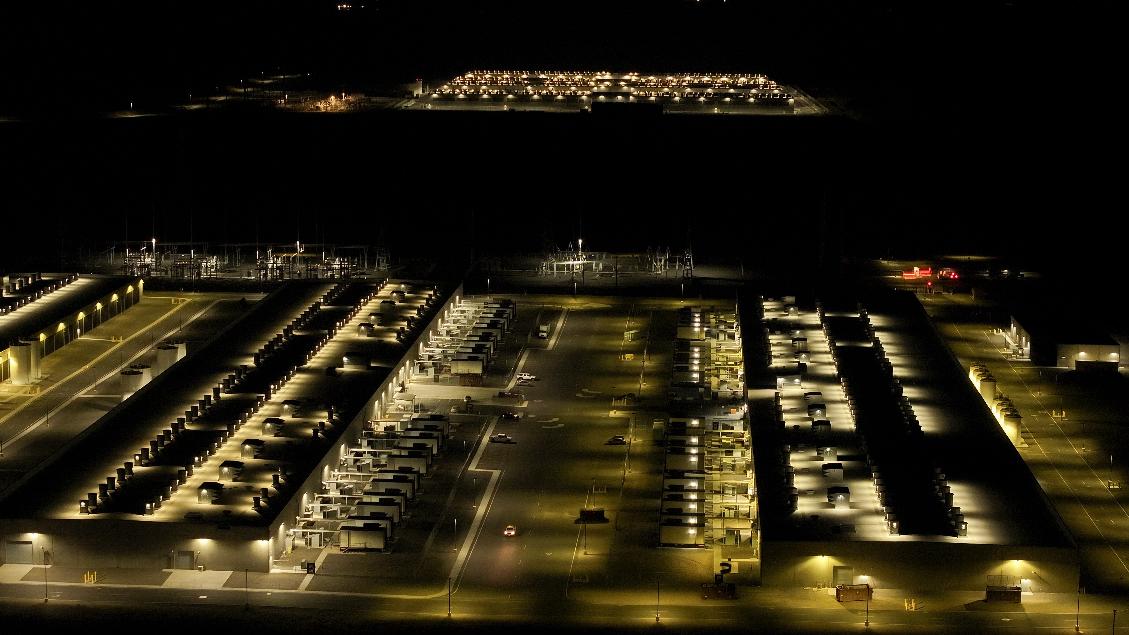 FILE - Amazon Web Services data center is visible at night Aug. 22, 2024, in Boardman, Ore. (AP Photo/Jenny Kane, File)