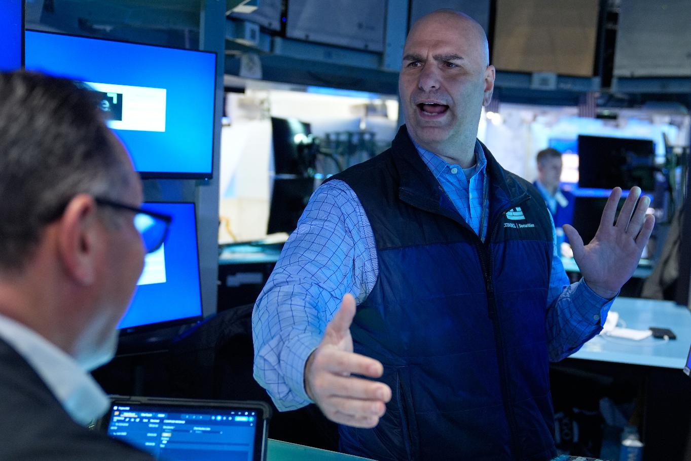 Philip Finale works on the floor at the New York Stock Exchange in New York, Tuesday, March 10, 2026. (AP Photo/Seth Wenig)