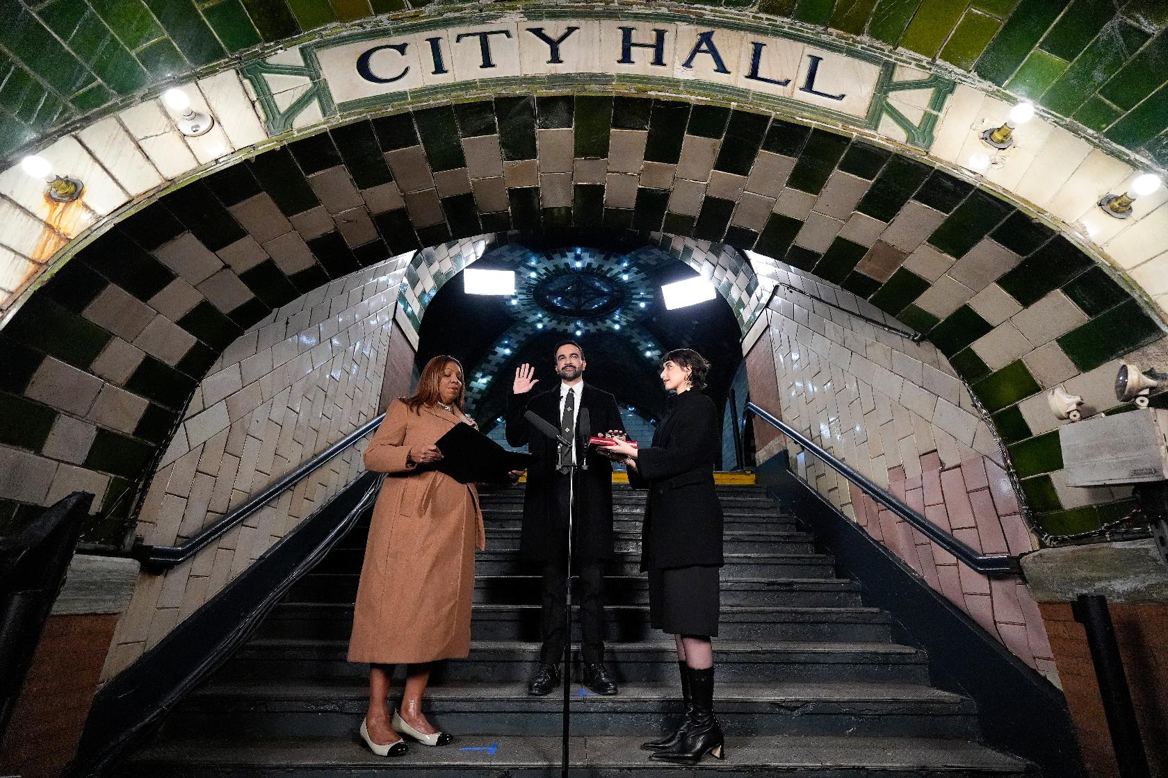 FILE - New York Attorney General Letitia James, left, administers the oath of office to mayor-elect Zohran Mamdani, center, as his wife Rama Duwaji looks on, Jan. 1, 2026, in New York. (AP Photo/Yuki Iwamura, File)