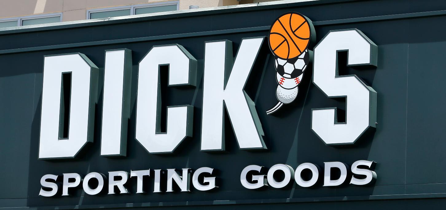 FILE -This photo taken Tuesday, Aug. 29, 2017, shows a Dick's Sporting Goods sign at a store in Miami. (AP Photo/Alan Diaz, File)