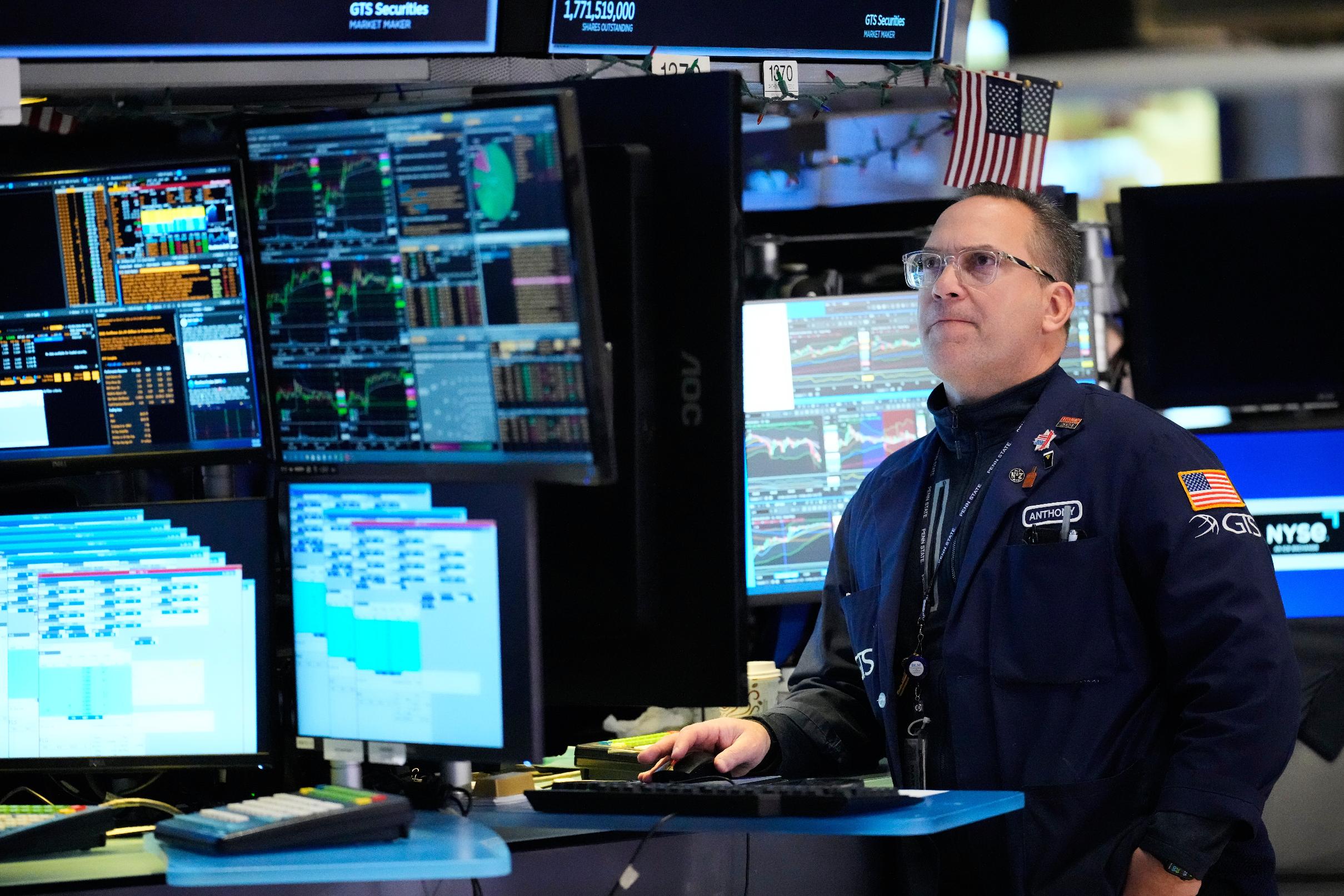 Anthony Matesic works on the floor at the New York Stock Exchange in New York, Thursday, March 5, 2026. (AP Photo/Seth Wenig)