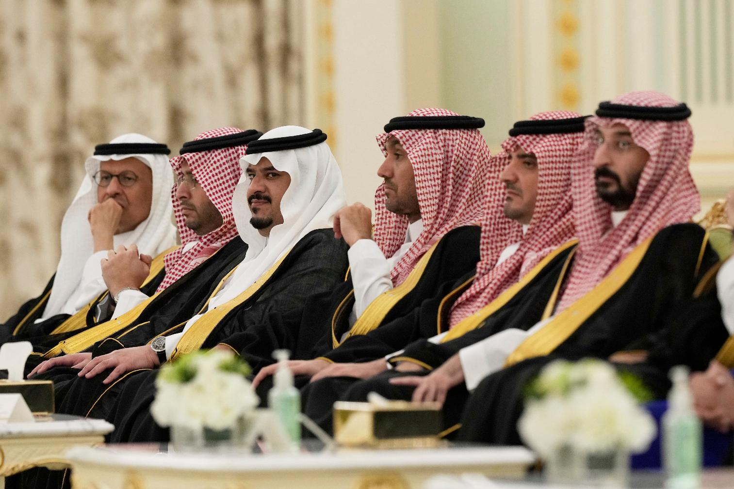 Saudi officials attend a signing ceremony at the Royal Palace in Riyadh, Saudi Arabia, Tuesday, May 13, 2025. (AP Photo/Alex Brandon)