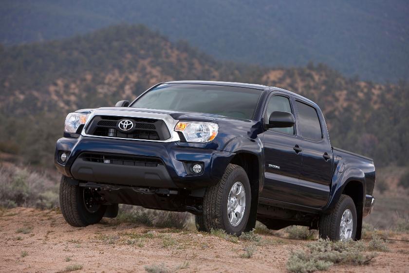 This photo provided by Toyota shows a 2014 Tacoma. If you're looking for a truck that's not quite full-size but not a compact pool cleaner's special either, the Tacoma could work out well. (Courtesy of Toyota Motor Sales U.S.A. via AP)