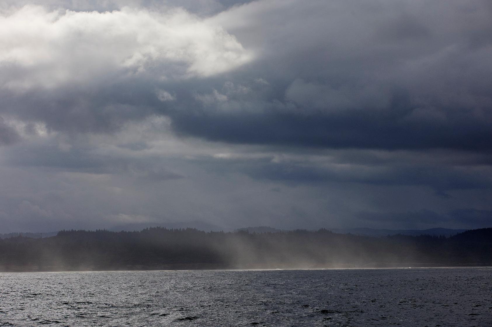 FILE - The area around the city of Newport, Ore. is visible from the Pacific Ocean near the PacWave South wave energy test site Aug. 23, 2024. (AP Photo/Craig Mitchelldyer, File)
