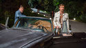 This image released by Warner Bros. shows Russell Crowe, left, and Ryan Gosling in a scene from "The Nice Guys." (Daniel McFadden/Warner Bros. via AP)