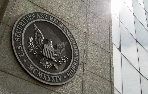 FILE - The seal of the U.S. Securities and Exchange Commission is seen at SEC headquarters, June 19, 2015, in Washington. (AP Photo/Andrew Harnik, File)