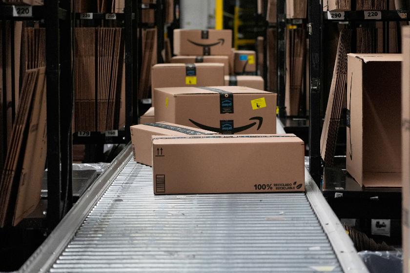 FILE - Boxes sit on a conveyor belt at an Amazon storage warehouse in Tepotzotlan, Mexico, May 22, 2025. (AP Photo/Marco Ugarte, File)