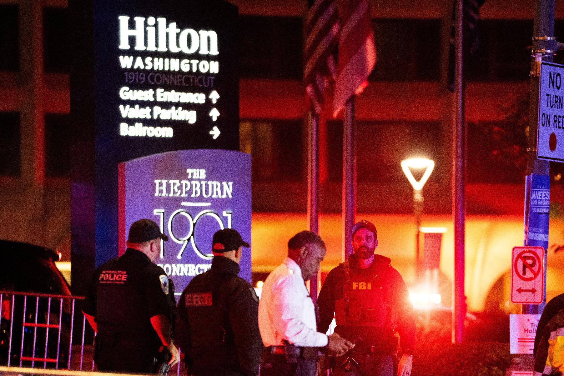FILE - Law enforcement responds to an incident at the Washington Hilton during the White House Correspondents Dinner, April 25, 2026, in Washington. (AP Photo/Allison Robbert, File)