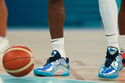FILE - United States' LeBron James (6) wears shiny shoes while warming up during a men's gold medal basketball game against France at Bercy Arena at the 2024 Summer Olympics, Saturday, Aug. 10, 2024, in Paris, France. (AP Photo/Rebecca Blackwell, File)